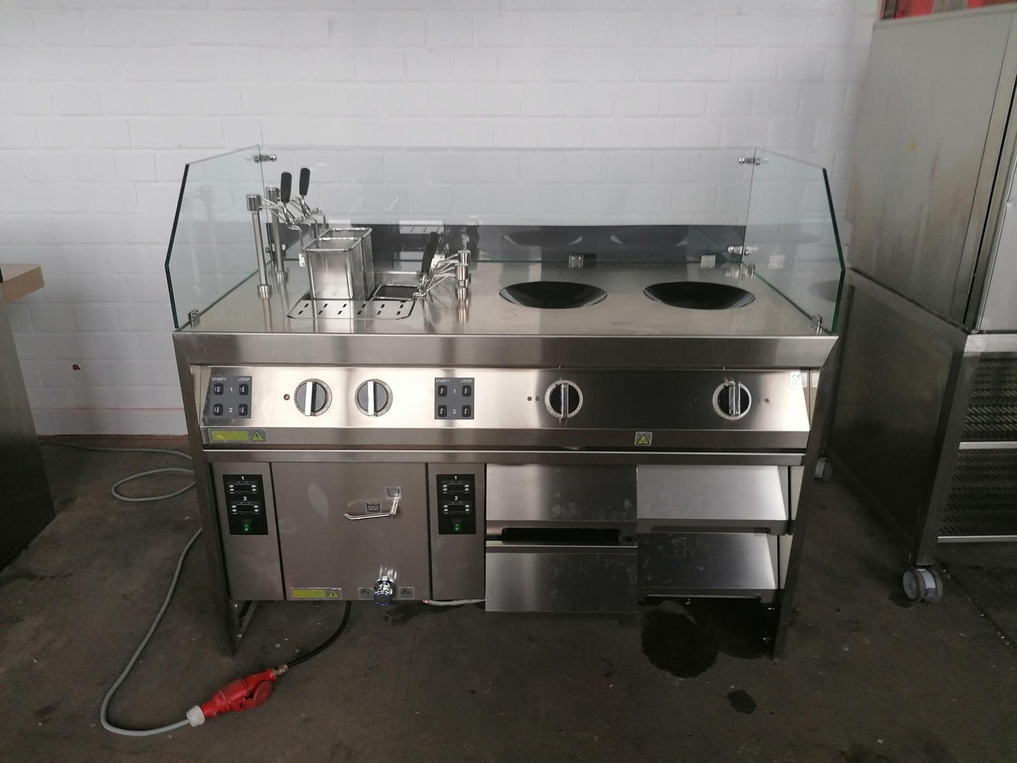 Premium Silko Professional Kitchens – equipped with 2x induction woks and 4x electric pasta cookers. High-quality stainless steel design, built for top-tier performance. Limited stock available at an exclusive price – act fast!