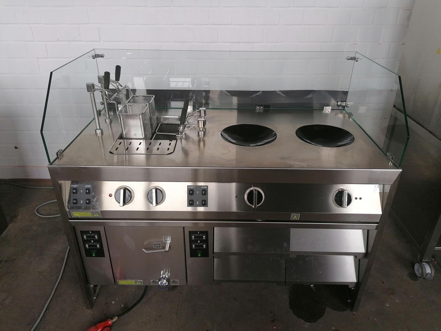 Premium Silko Professional Kitchens – equipped with 2x induction woks and 4x electric pasta cookers. High-quality stainless steel design, built for top-tier performance. Limited stock available at an exclusive price – act fast!